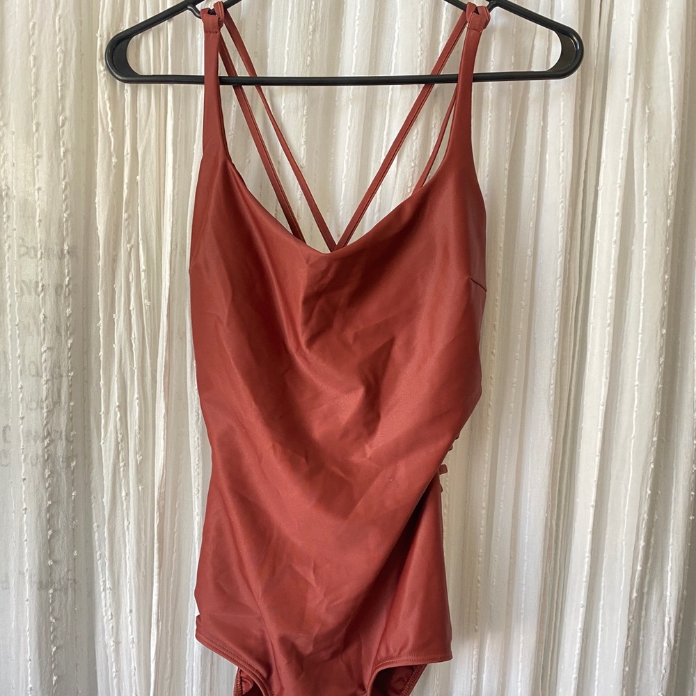 Strappy NWT Albion Fit One Piece!